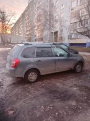 Lada Kalina 2014 года, 87 лс, пробег 180000 км. Цвет: серебристо-темно-серый. VIN: XTA219410E0039511, ПТС: 63ХН317145, госномер: Е543ЕХ73. Страна-изготовитель: Россия, объем двигателя: 1596 см³, мощность: 87 лс (64 кВт).