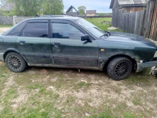 Audi 80, 1988 год, зеленый. VIN: WAUZZZ89ZJA142864, ПТС: 60 ТК 306158. Германия. Двигатель: бензиновый, модель RU, номер 033527, мощность 75 л. с. (55 кВт), объем 1760 см³. Кузов: WAUZZZ89ZJA142864.