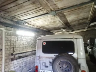 Земельный участок 2650 кв.м с постройками Котлас, кадастровый номер 29:24:010204:82 с расположенными на нем объектами недвижимого имущества: здание гаража котласской поликлиники, кадастровый номер 29:24:010204:210, здание склада котласской поликлиники, кадастровый номер 29:24:010204:209; здание…