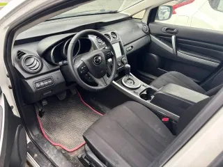 Mazda CX-7, 2011 Mazda CX-7, 2011 года, 163 лс, 134000 км, АКПП, Автомобиль MAZDA CX-7, 2011 года выпуска, VIN: JMZER19L700234899. Техническое состояние автомобиля: стартер при запуске не включается, спущены колеса, зимние шины. ЛКП заводское за исключением некоторых деталей.