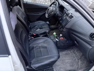 LADA 219010 LADA GRANTA. Год выпуска: 2019. VIN: XTA219010K0591052. Цвет кузова: Белый. Объем двигателя: 1596 см³. Мощность: 64 кВт / 87 л.с. Экологический класс: 5. Тип: Легковой седан. Автомобиль на ходу. Под замену задние тормоза (колодки, барабаны, цилиндры выжимные). Замена задней подвески в…