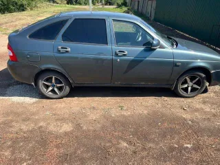 Автомобиль LADA Priora 2011 года выпуска, VIN XTA217230В0178881. Авто на ходу. Требуется покраска, начинает ржаветь. Трещина на лобовом стекле. Требуется переварка дна. Требуется проверить электрику. В залоге.