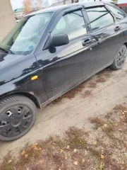 Lada Priora 2011 года, модель 217230, Приора 1.6. Цвет сине-черный. VIN: XTA217230B0146925. ПТС: 22РС631238. Государственный регистрационный знак А176МА122. Изготовитель: ОАО АВТОВАЗ (Россия). Модель двигателя 21126, бензиновый, мощность 97.9 л.с. (71.3 кВт), рабочий объем 1596 куб. см. Номер…