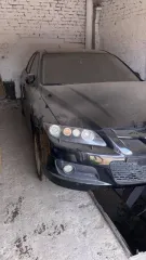 Mazda 6 2006 года, черный седан. VIN: JMZGG82L601684252, мощность 260 л.с. (191.2 кВт). Состояние: отсутствует коробка передач и двигатель, коленвал сломан.