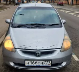 Лот №1 Легковой автомобиль Хонда Фит 2001 года выпуска. Регистрационный знак H166CH777. Кузов № GD1 1064032, тип ТС: легковой комби  хэтчбек , модель, № двигателя: L13A 1070696, шасси: отсутствует, цвет кузова: серый, мощность двигателя 86  64.5  л.с.  кВт , рабочий объем двигателя: 1339 куб.см…