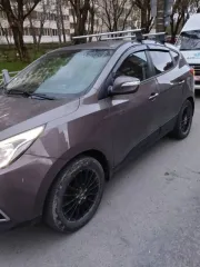 Hyundai ix35 2014, 150 лс, 154644 км, полный привод, VIN TMAJU81ECFJ706450, цвет коричневый.