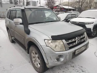 Mitsubishi Pajero 2012 года, дизельный двигатель 3.2 л (200 л.с.), АКПП, полный привод, левый руль, цвет серебристый, пробег 191868 км, VIN JMBLYV98WCJ002967.
