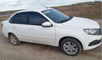 Легковой автомобиль LADA GRANTA, 2020 г.в., VIN XTA219010L0699237, р/з А987ОА702, мощность двигателя, кВт/л.с. 64/87, цвет: белый. Находится в залоге у Боровикова Николая Юрьевича.