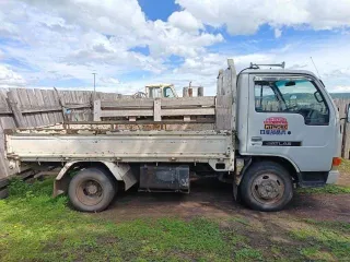 Nissan Atlas 1992 года, государственный номер Р322КЕ124. VIN отсутствует.