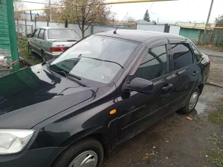 LADA GRANTA 2014 <p>Легковой седан Lada 219060 Lada Granta, 2014 г.в., VIN: XTA219060E0295373, мощность (кВт/л.с.): 60/81.6, цвет: черный.</p>