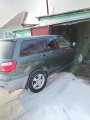 Автомобиль марки Mitsubishi модель Outlander, VIN: JMBXNCU2W5U000983, год выпуска 2004.