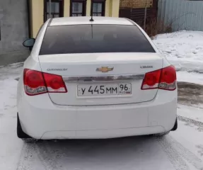 транспортное средство Chevrolet Cruze,   VIN XUFJF696JC3052207  год выпуска 2012  Цвет: Белый  Механическая коробка передач  МКПП   Как обеспеченное залогом имущества АО «ТБанк»  ИНН 7710140679 .