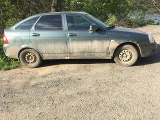 Lada Priora 2012 года, цвет Серо-Синий-Зеленый. VIN: XTA217230C0204057, ПТС: 63НМ940185, номер Р162ОА163. Двигатель 97.9 л.с. (72.0 кВт), объем 1596 куб.см.