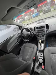 Легковой автомобиль, марка: Chevrolet, модель: Aveo, 2013 года выпуска, цвет: серый металлик, VIN: XUFTA69EJDN002640, мощность двигателя: 85 л. с. (116 кВт), разрешённая максимальная масса: 1619 кг, масса без нагрузки: 1314 кг.