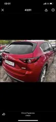 Mazda CX-5 2019 года выпуска, цвет красный, VIN JM3KFBDM3K1626355, государственный номер О510РН29. Состояние: скол краски на задней правой двери, скол на заднем бампере слева. Вид транспорта: легковой.