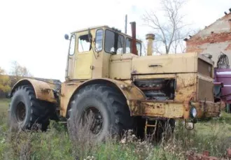 Колесный трактор К-701 1991 года выпуска, госномер 4803КО45, заводской номер 9100725, двигатель 00424, желтый цвет.