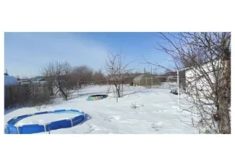 Земельный участок и жилой дом в селе Бобровка Челябинской области по адресу: Челябинская область, Троицкий район, село Бобровка, улица Красных Партизан, дом 15. Кадастровые номера: 74:20:2307001:141 (земельный участок) и 74:20:2307001:761 (жилой дом).