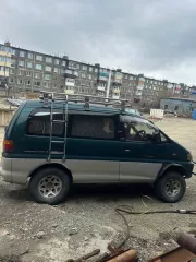 Автомобиль Mitsubishi Delica, 1990 года выпуска, цвет – зеленый, государственный номер А810РС41, номер кузова (прицепа) PE8W0114479, номер двигателя CD6899, мощность двигателя – 125 л.с, объем двигателя – 2476 куб. см. Автомобиль Mitsubishi Delica, 1990 года выпуска, цвет – зеленый, государственный…