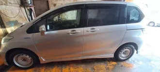 Автомобиль Honda Freed Hybrid, 2011 года выпуска, VIN отсутствует.