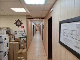 Земельный участок площадью 701 кв. м, кадастровый номер 51:20:0003184:348 (категория земель: земли населенных пунктов, вид разрешенного использования: автостоянки для временного и постоянного хранения индивидуальных легковых автомобилей открытого типа наземные охраняемые и неохраняемые гостевые…