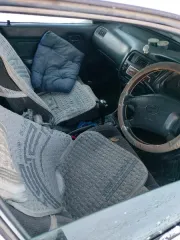 Toyota Corolla 2001 года, государственный номер М496МН27. Номер двигателя 2099642, номер кузова ЕЕ1030108197. Цвет белый.