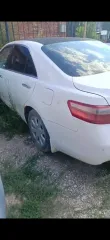 Toyota Camry 2007 года, VIN JTNBE40K203133274. Год выпуска 2007, мощность двигателя 167 л.с., рабочий объем 2362 куб. см, цвет белый. Разрешенная максимальная масса 1985 кг, масса без нагрузки 1540 кг. ПТС 34 РЕ 512708. Автомобиль после ДТП, не на ходу, требует ремонта. Обременен залогом в пользу…