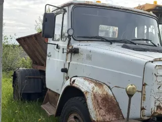 КО829А-02, 2006, регистрационный номер Е356 КК10, VIN XVL48330060000302, модель, № двигателя 506.10 50275031, шасси (рама) №433362 5 3484453, кузов № 433360 50045270, цвет белый, год изготовления 2006. Наличие ПТС: есть. Год выпуска 2006, марка грузовика КО, модель КО-829А-02, VIN XVL48330060000302.