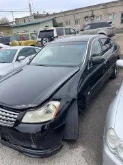 Nissan Fuga 2005 года, VIN PY50-215610, регистрационный номер 777DW A01 (республика Казахстан). Объем двигателя 3490 куб.см, седан черного цвета. Без ключей. Имеются повреждения: деформация передней части капота и левого переднего крыла, разбита левая передняя фара, на деформированном переднем…