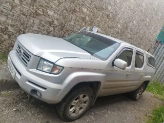 Honda Ridgeline 2006 автомобиль Honda Ridgeline, 2006 года выпуска, цвет - серый, государственный номер В969МУ41, идентификационный номер (VIN) 2HJYK16487H512426. Вид транспорта: Легковой универсал. Год выпуска: 2006. Государственный регистрационный знак: В969МУ41. VIN номер: 2HJYK16487H512426…
