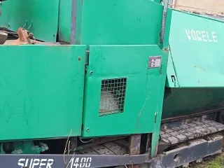 Vogele 1400, 1994 Асфальтоукладчик Vogele 1400, 1994 года выпуска; цвет желтый; мощность двигателя л.с./кВт 67/49