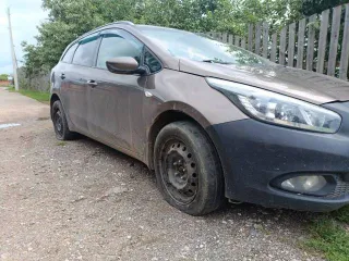 Kia Ceed 2012 года, цвет коричневый, VIN XWEHN812BD0000022.