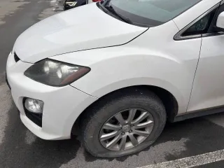 Mazda CX-7, 2011 Mazda CX-7, 2011 года, 163 лс, 134000 км, АКПП, Автомобиль MAZDA CX-7, 2011 года выпуска, VIN: JMZER19L700234899. Техническое состояние автомобиля: стартер при запуске не включается, спущены колеса, зимние шины. ЛКП заводское за исключением некоторых деталей.