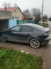 Mazda 3 2005 года выпуска, черный цвет. VIN: JMZBK12Z561296176, госномер: М815АС126. Мощность двигателя 77 л.с. (105 кВт), рабочий объем 1598 куб. см.