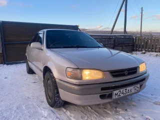Toyota Corolla, 1997, VIN отсутствует. Характеристика: залог у "Ваш Инвестор". Хрустит наружный шрус с правой стороны. Сайлентблоки и подушки двигателя нужно менять. По корпусу автомобиля множественные следы коррозии и левая сторона в вмятинах.
