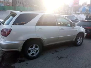 Легковой автомобиль марки Toyota Harrier, 1999 года выпуска, регистрационный номер В799НУ125, кузов № SXU150007999.