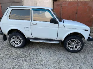 LADA 4x4 2012, VIN: XTA212140D2105709, цвет кузова: ярко белый. Есть конструктивные изменения.