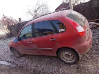 LADA Kalina 2010 года выпуска, государственный номер А764УХ21, VIN ХТА111960В0137837, цвет серебристо-красный.