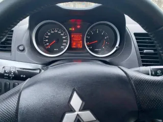 Mitsubishi Lancer 2010 года, 109 л.с., пробег 232 245 км, АКПП, бензин, VIN – JMBSRCY2AAU005626.