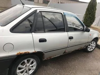 Daewoo Nexia 2006 года выпуска, серый светлый, VIN: XWB3D31UD6A067407, госномер: A821MC73.