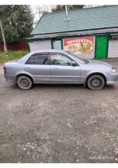 Автомобиль марки Мазда 323, год выпуска: 2003, двигатель: 664628, кузов: JM6BJ10M200209302 Шасси:   Мощность двигателя: 115 л.с.  84.6 кВт  СТС: 9959605720.