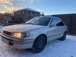 Toyota Corolla, 1997, VIN отсутствует. Характеристика: залог у "Ваш Инвестор". Хрустит наружный шрус с правой стороны. Сайлентблоки и подушки двигателя нужно менять. По корпусу автомобиля множественные следы коррозии и левая сторона в вмятинах.