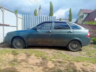Lada Priora 2009 года, 98 л.с., 152122 км. Транспортное средство марки (модели) Lada, 217280, VIN: XTA21723090076251, ГРЗ: О066РС36, шасси отсутствует, кузов (кабина, прицеп): XTA21723090076251, цвет серо-сине-зеленый, коробка передач механика, мощность двигателя 98 (72) л.с., экологический класс…