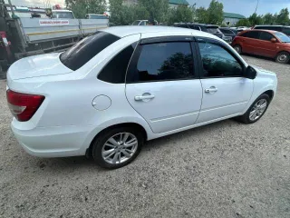 Lada Granta 2024 года, 90 лс, пробег 55094 км. Седан, цвет белый, госномер P669KO186, VIN XTA219070R1026951, ЭПТС 1643 01085512817, СТС 99 62 856358.