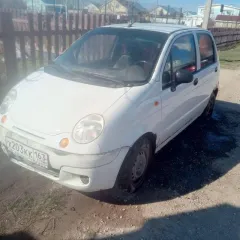 Daewoo Matiz 2012 года выпуска, цвет бело-дымчатый. VIN: XWB4A11EDCA034051, ПТС: 02 УР 003055, государственный номер: Х203КК163.