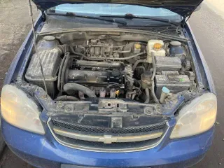 Chevrolet Lacetti 2009 года выпуска, синий цвет. VIN: XUUNA196J9C001296.