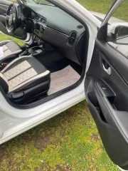 Автомобиль Kia Rio, 2017 года выпуска, VIN Z94C341BBJR022464, цвет белый, объем двигателя 1591 см³, мощность 123 л.с., тип кузова седан.