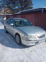 Автомобиль Mazda Capella 2000 года выпуска, серебристый цвет. Государственный номер А245РР27. Кузов GF8P 201936. Разрешенная максимальная масса 1490 кг, масса без нагрузки 1180 кг.
