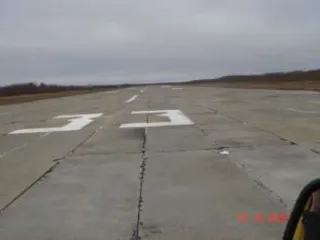 Взлетно-посадочная полоса в аэропорту г. Кедровый. Нежилое сооружение – взлётно-посадочная полоса, протяженность 1980 м, ширина 36 м. Кадастровый номер 70:18:0000006:910, адрес Томская область, г. Кедровый, квартал 22, сооружение 55а