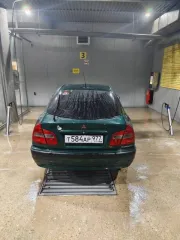 Mitsubishi Carisma 1999 года, VIN: XMCLNDA1AYF008099. В хорошем состоянии, мотор работает нормально, по ходовой все хорошо. Не работает кондиционер, нужно залить фреон. Резина зимняя, один сезон отъездила, на штампах. По кузову имеются царапины, ржавчина и вмятины.