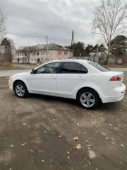 Mitsubishi Lancer 2010 года, 109 л.с., пробег 232 245 км, АКПП, бензин, VIN – JMBSRCY2AAU005626.